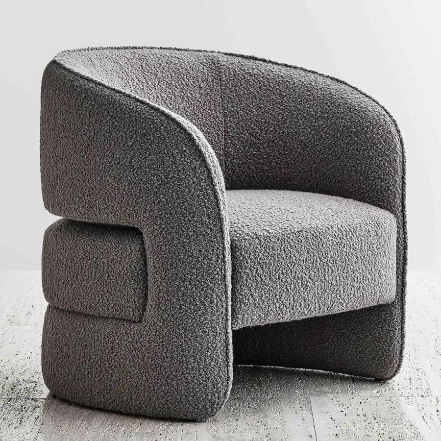 Superior Rugiano Ambra lounge chair with textured medium gray textile upholstery and curved lines
