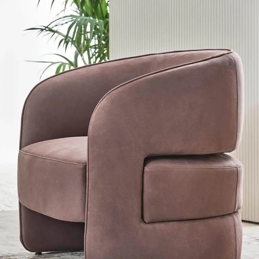 Superior Rugiano Ambra lounge chair with sinuous silhouette fully upholstered in muted brown high-end fabric