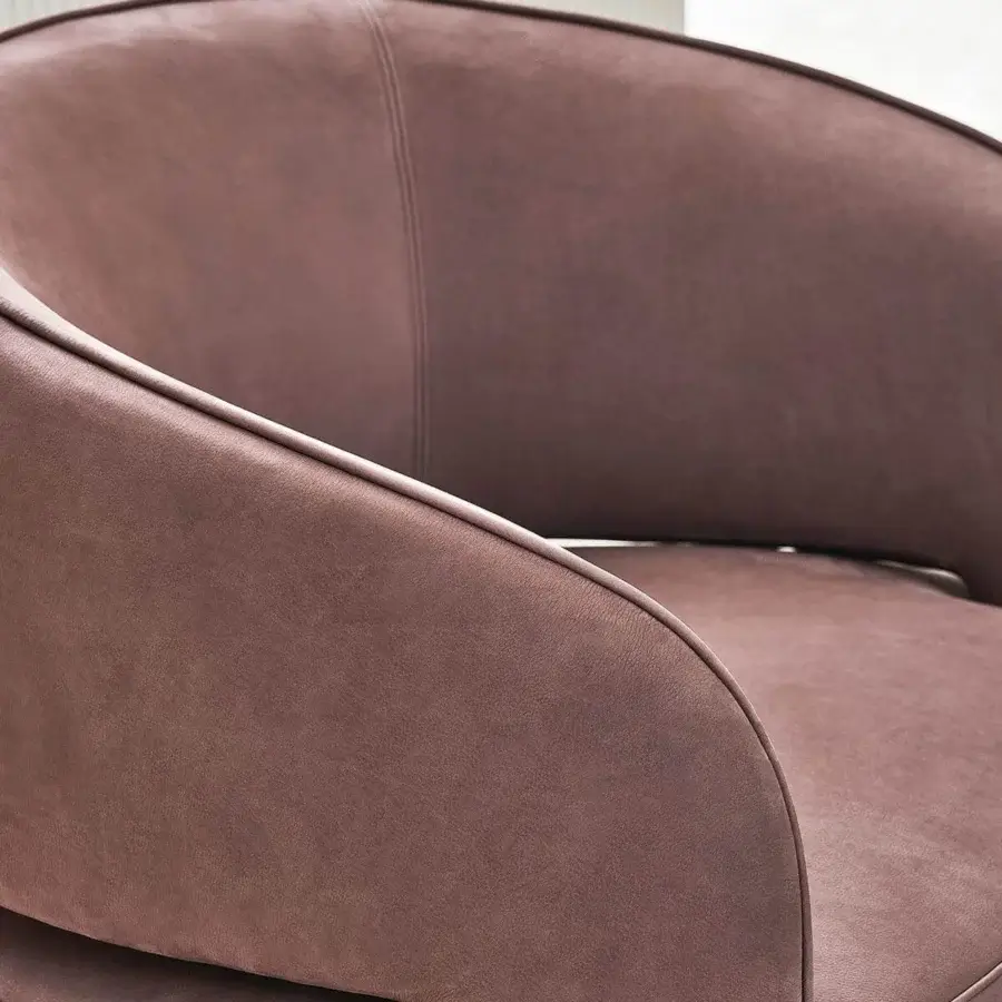 Distinguished Rugiano Ambra lounge chair with curved organic silhouette completely upholstered in high-end mauve-brown textile and smooth finish