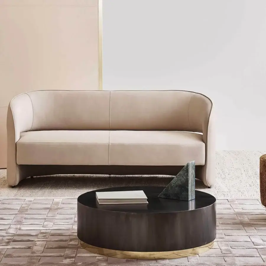 Exceptional Rugiano Ambra sofa with low curved silhouette upholstered in smooth light beige fabric and matte finish