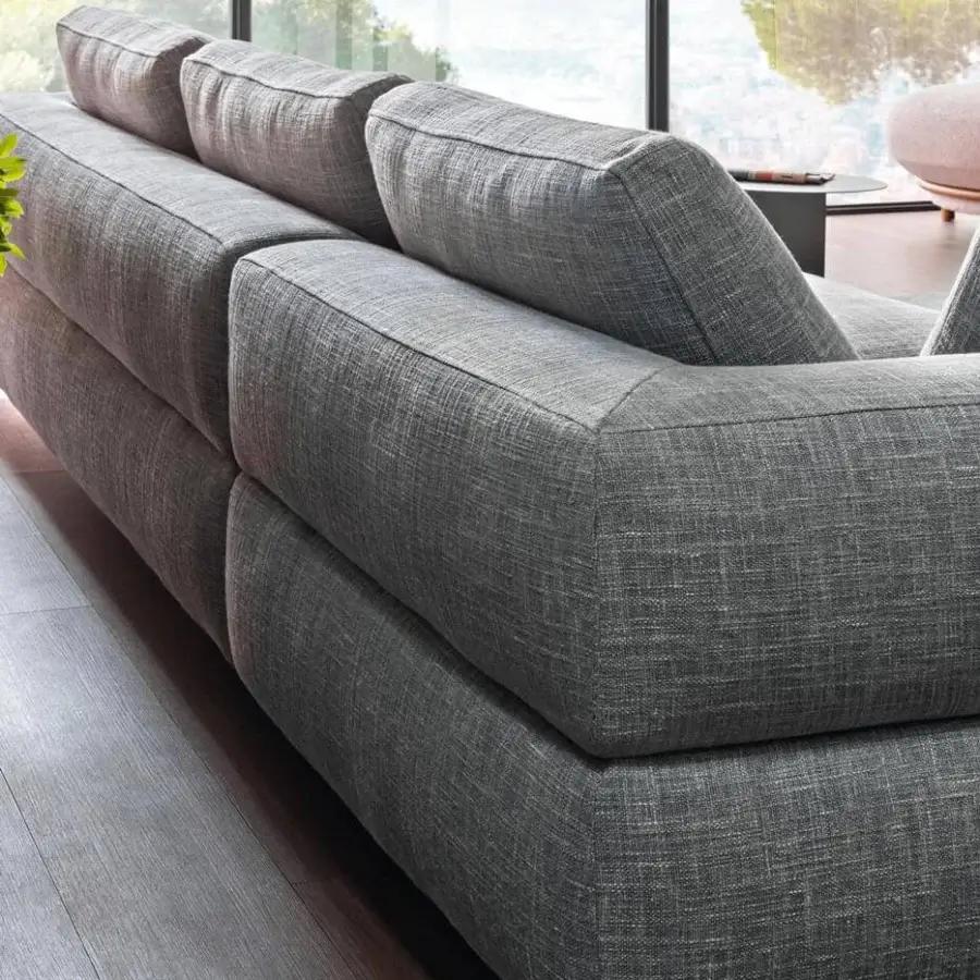 Elegant Bonaldo Ever More sectional with linear design upholstered in textured gray textile and flat-shaped matt-painted metal feet