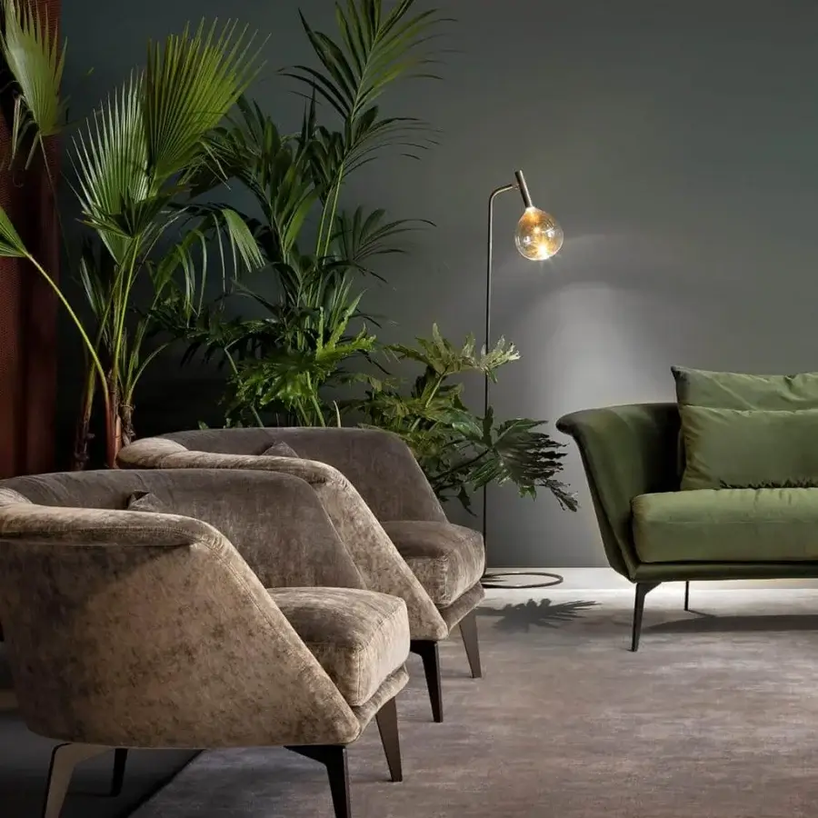 Captivating Bonaldo Lovy lounge chair with semi-oval form upholstered in warm grey textile and matt painted metal legs