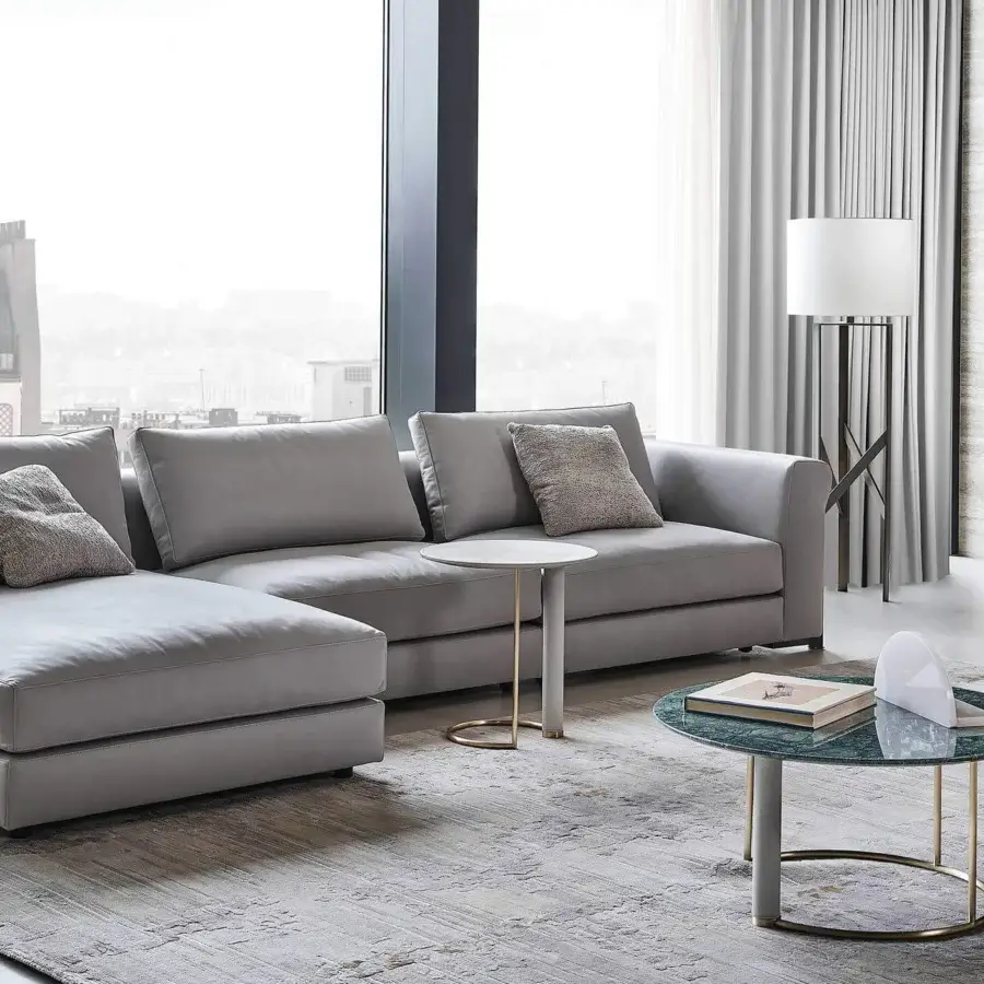 Distinguished Rugiano Opale side table with light marble top and leather-covered cylindrical leg built with a brushed brass base