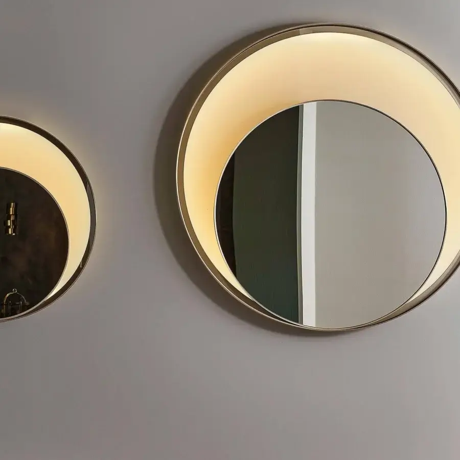 Distinguished Rugiano Double Ring mirror with bronzed brass frames and a backlit illuminated circle within a larger reflective surface
