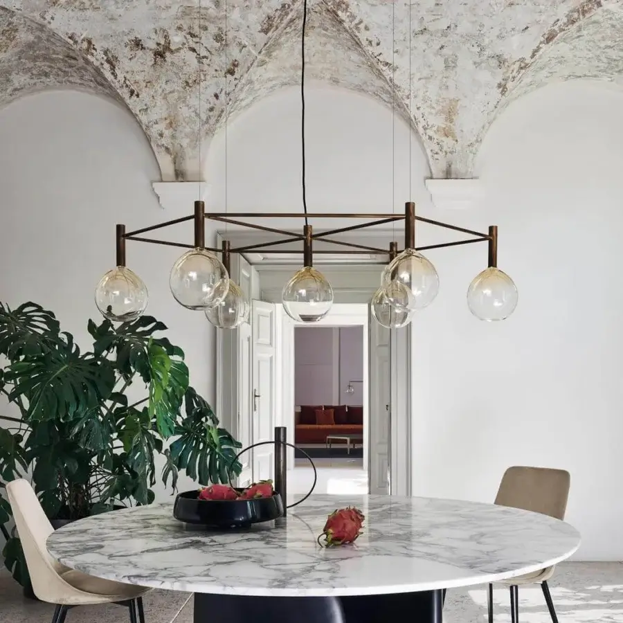 Distinguished Bonaldo Mellow table with swirling grey and white marble top and rigid black polyurethane base crafted in Italy