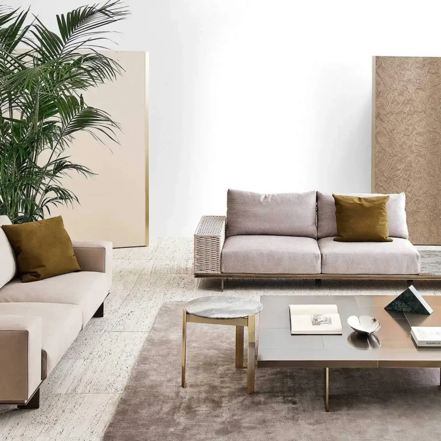 Distinguished Rugiano Memphis sofa with light beige fabric upholstery and linear metal base crafted in Italy