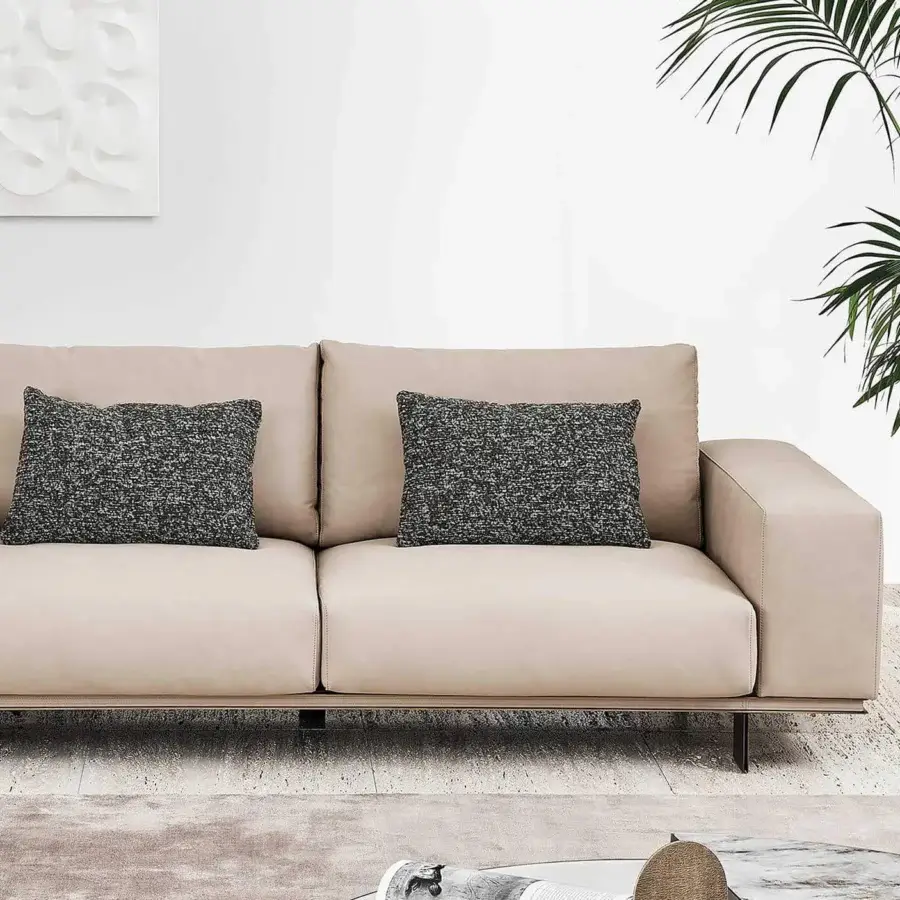 Exceptional Rugiano Memphis sofa with light beige textile upholstery, dark gray cushions and a linear metal base with smooth finish