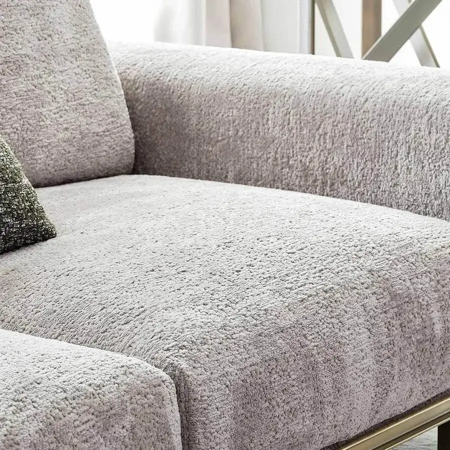 Distinguished Rugiano Memphis sofa with light gray textile upholstery and gold finished linear metal base