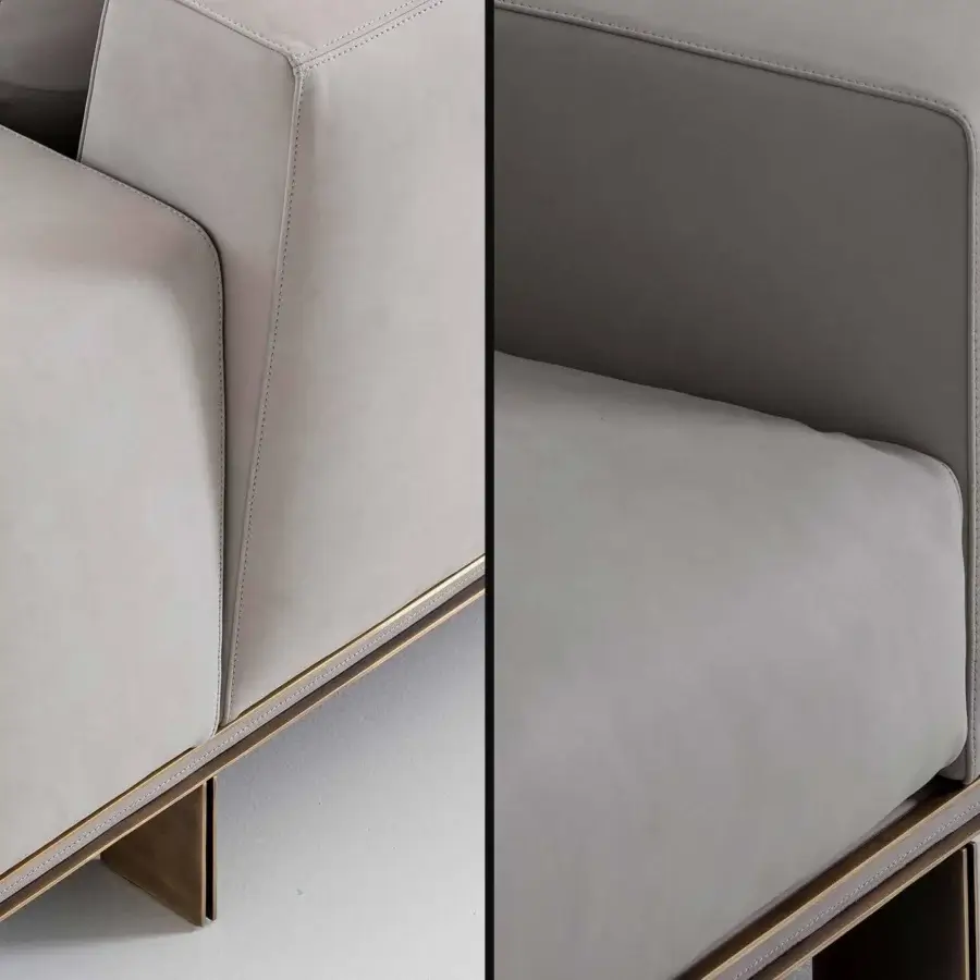 Exceptional Rugiano Memphis sofa with light gray textile upholstery and matte bronze metal trim