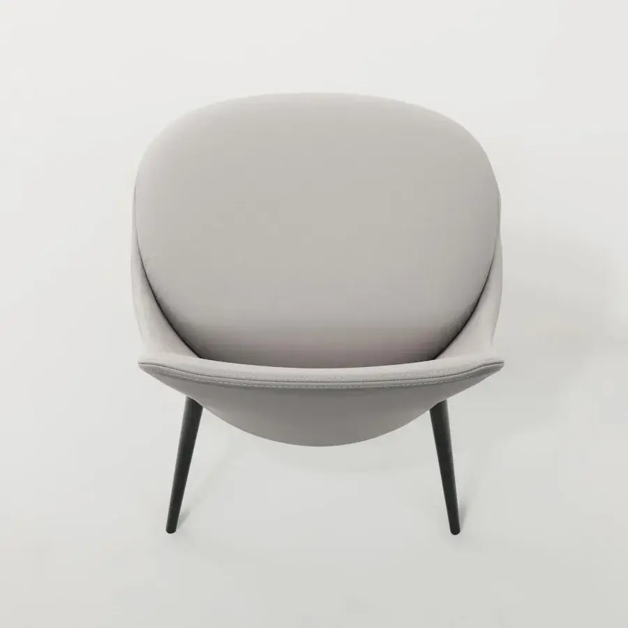 Sophisticated Bonaldo Itala chair with softly rounded silhouette entirely in light gray fabric and sleek black metal legs