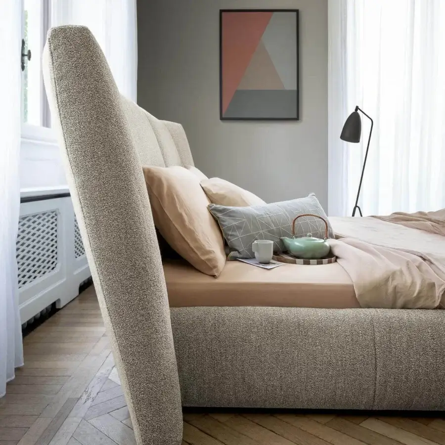 Exceptional Bonaldo Youniverse bed with high padded headboard upholstered in textured matte beige fabric and wide base