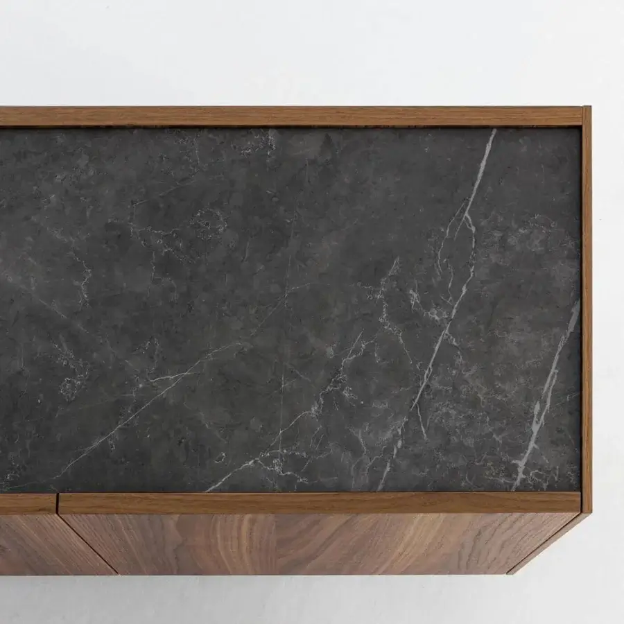 Distinguished Bonaldo Outline sideboard crafted in canaletto walnut with dark ceramic inset and a cool stone aesthetic