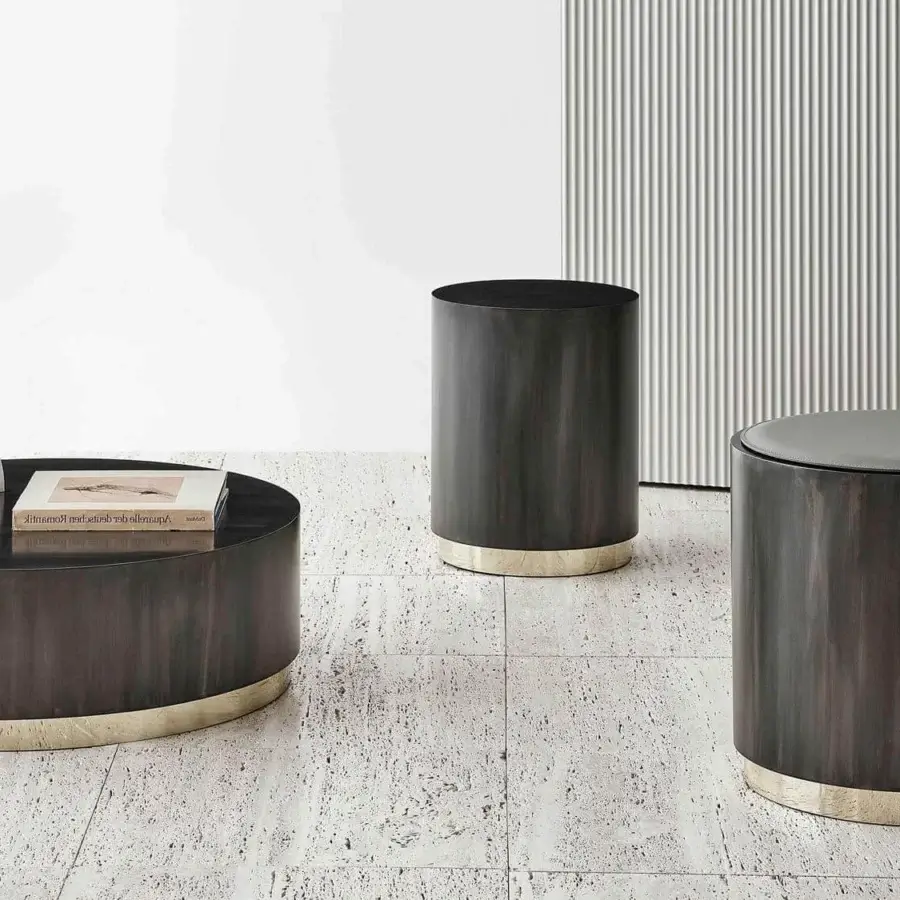 Exclusive Rugiano Genesi side table crafted in flamed iron with lustrous gold detail at the base for contemporary living