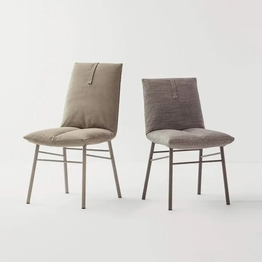 Sophisticated Bonaldo Pil chair with dark gray textile and vertical strip detail on the backrest