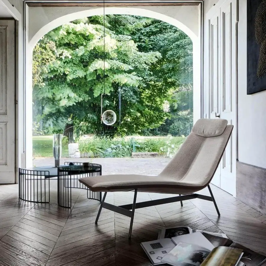 Elegant Bonaldo Alpilles chaise lounge with light beige textile upholstery and matt painted metal base