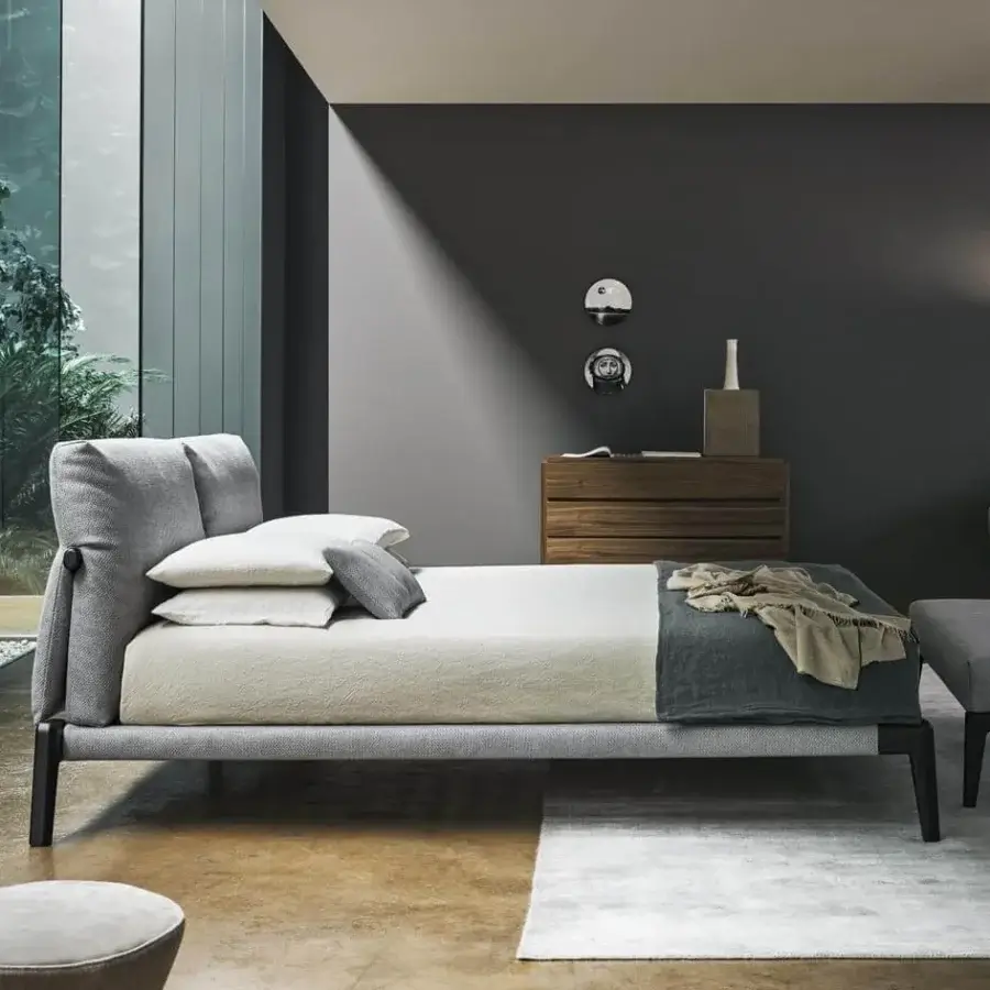 Sophisticated Bonaldo Kriss bed with dark gray textile upholstery and visible wooden structure built with a matte finish