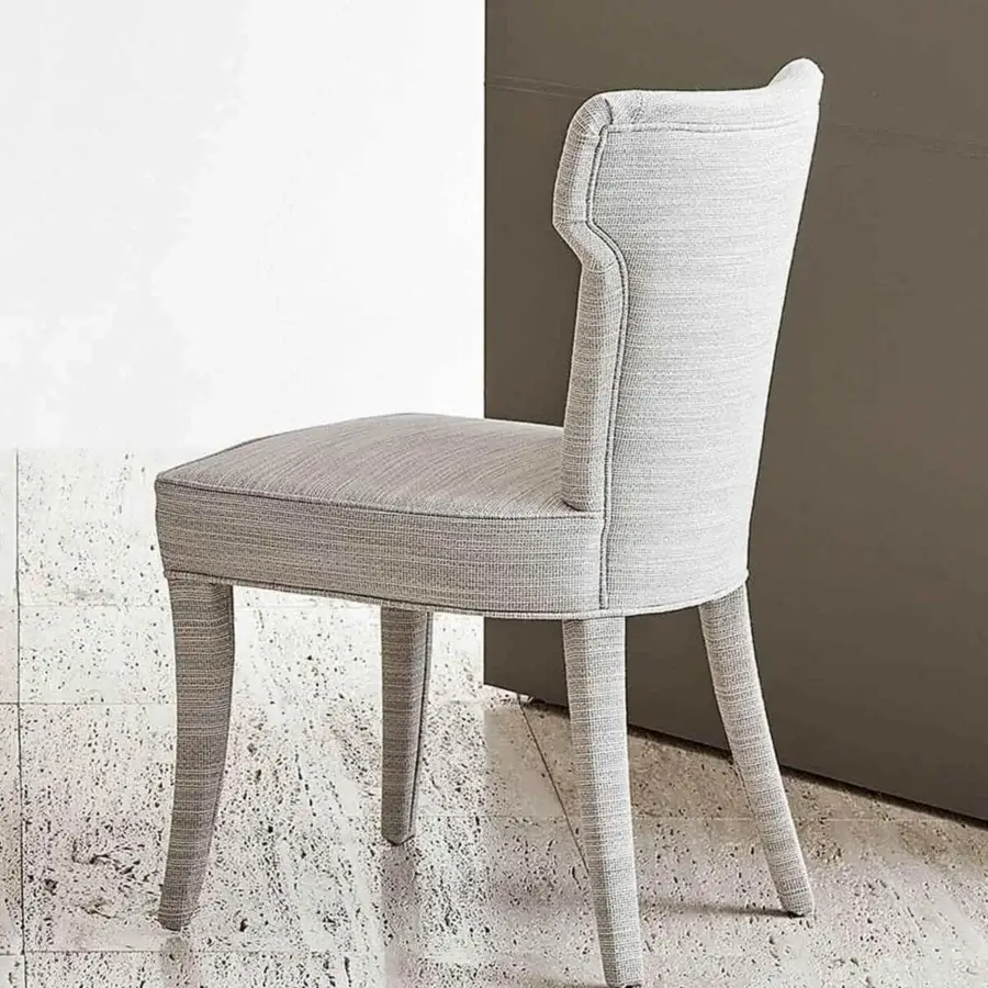 Sophisticated Rugiano Guenda chair with harmonious lines and light gray textile upholstery, crafted in Italy