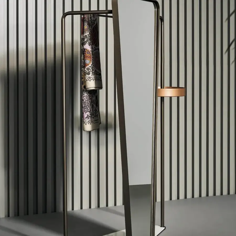 Elegant Bonaldo Camillo valet stand with mirror, built in bronze metal with a white marble-like panel and patterned textile draping