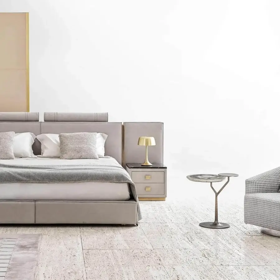 Captivating Rugiano Wanda table lamp with slender metallic structure in golden finish and circular marble-like accent