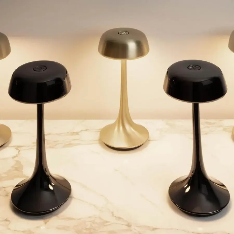 Lavish Rugiano Wanda table lamp crafted in lustrous gold metallic structure with graceful curves for contemporary spaces