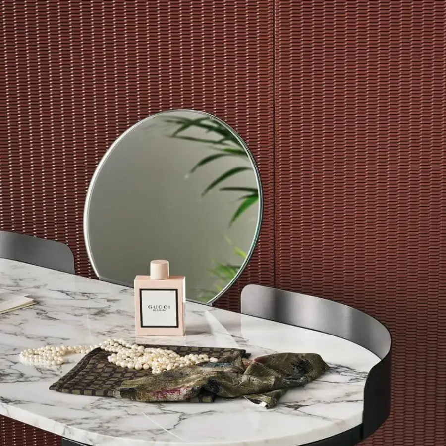 Distinguished Bonaldo Asia vanity with refined oval marble top and dark finished metal support structure