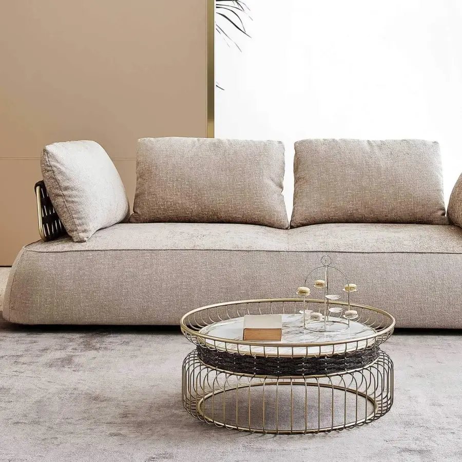Exclusive Rugiano Melody sofa with woven metal armrests and backrests in light beige textured textile upholstery
