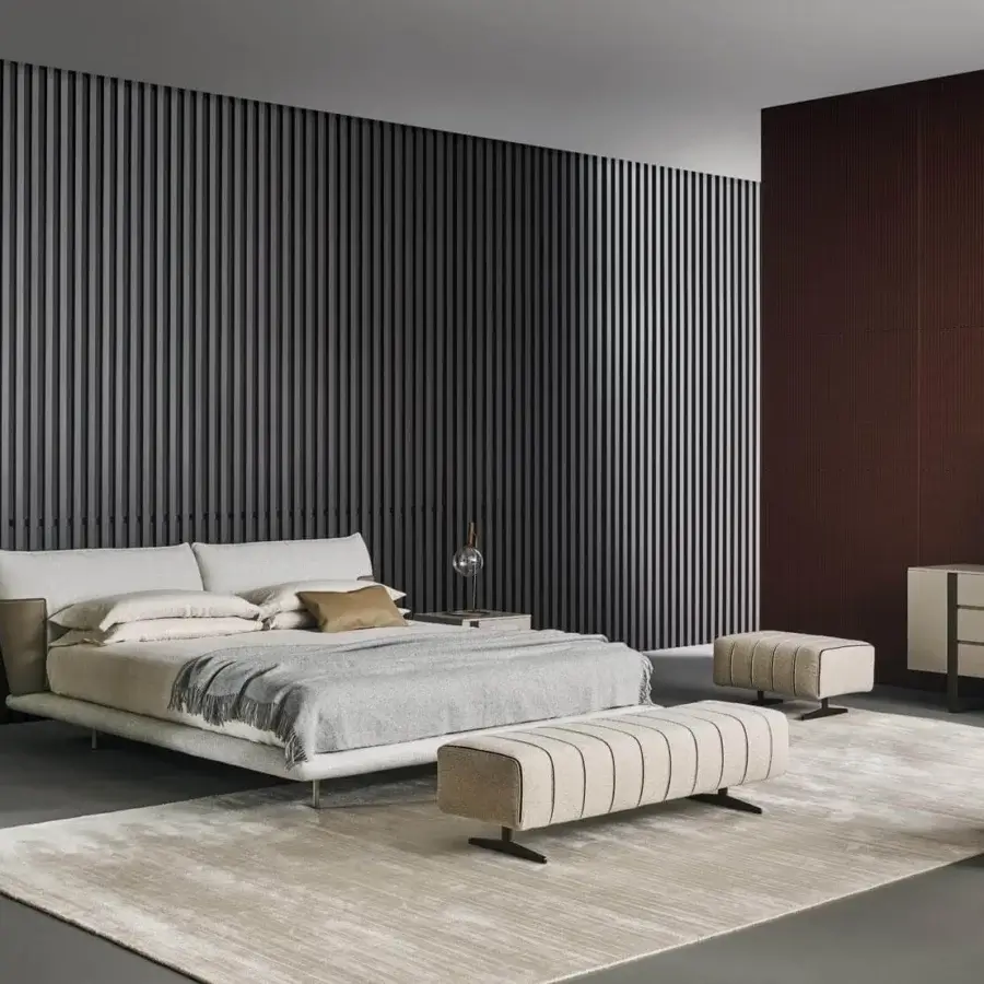 Sophisticated Bonaldo Mark bench with light beige textile upholstery accented with dark striped detailing and precious leather inserts