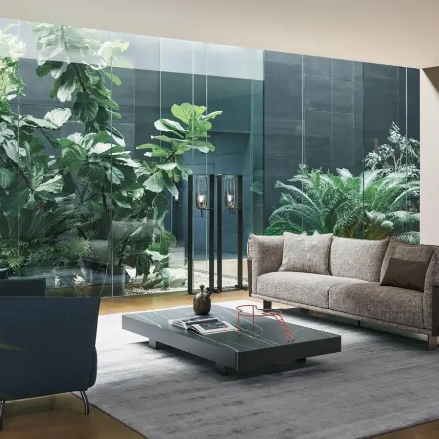 Elegant Bonaldo Blend sofa with light gray textured fabric and dark brown emery leather detailing in sleek matt painted metal