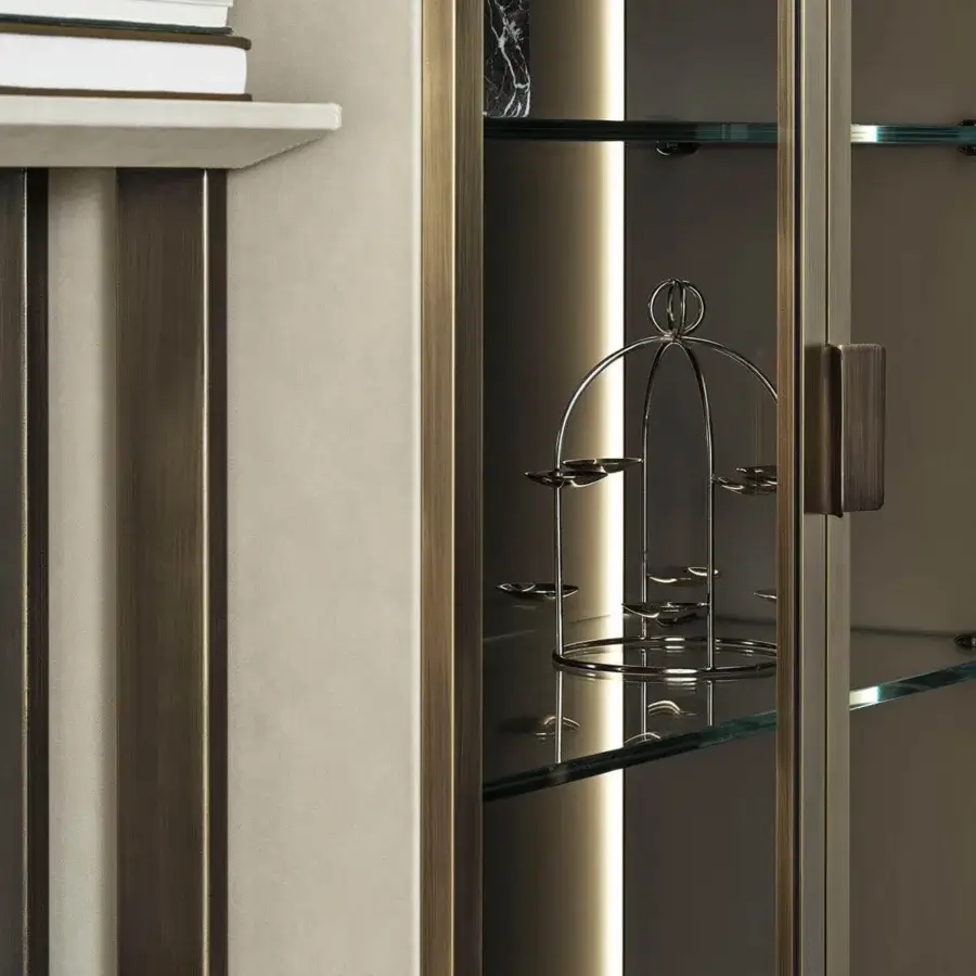 Exclusive Rugiano Frame bookcase with a metallic structure and sumptuous leather shelving in neutral beige and brown tones with a bronze finish