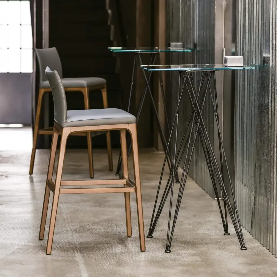 Distinguished Cattelan Italia Arcadia stool with olive green textile upholstery and natural beech frame with satin finish