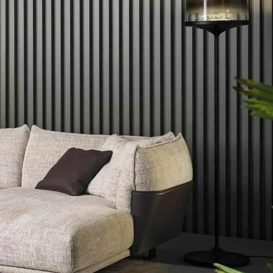 Superior Bonaldo Blend sectional with light beige fabric upholstery and dark brown emery leather accents with matt painted metal feet