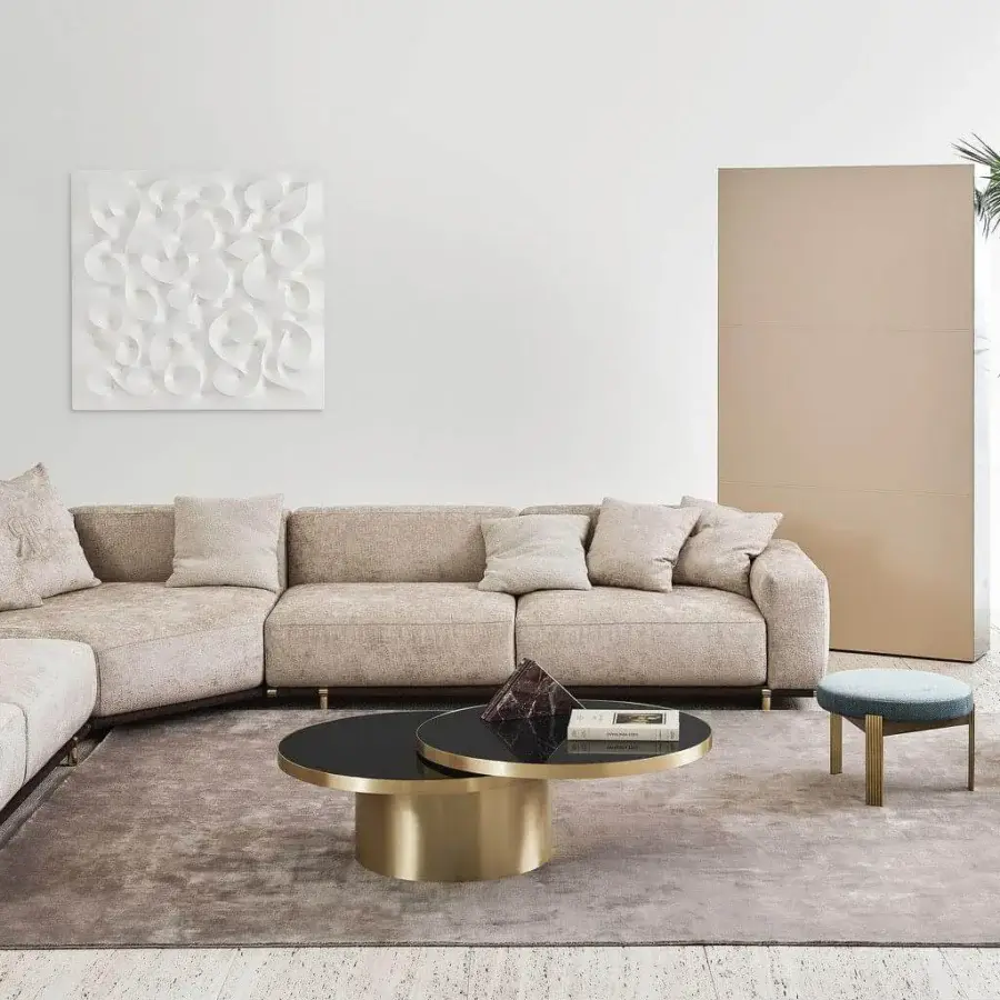 Lavish Rugiano Boheme sectional with light beige woven fabric and a luxurious metal base crafted with leather details