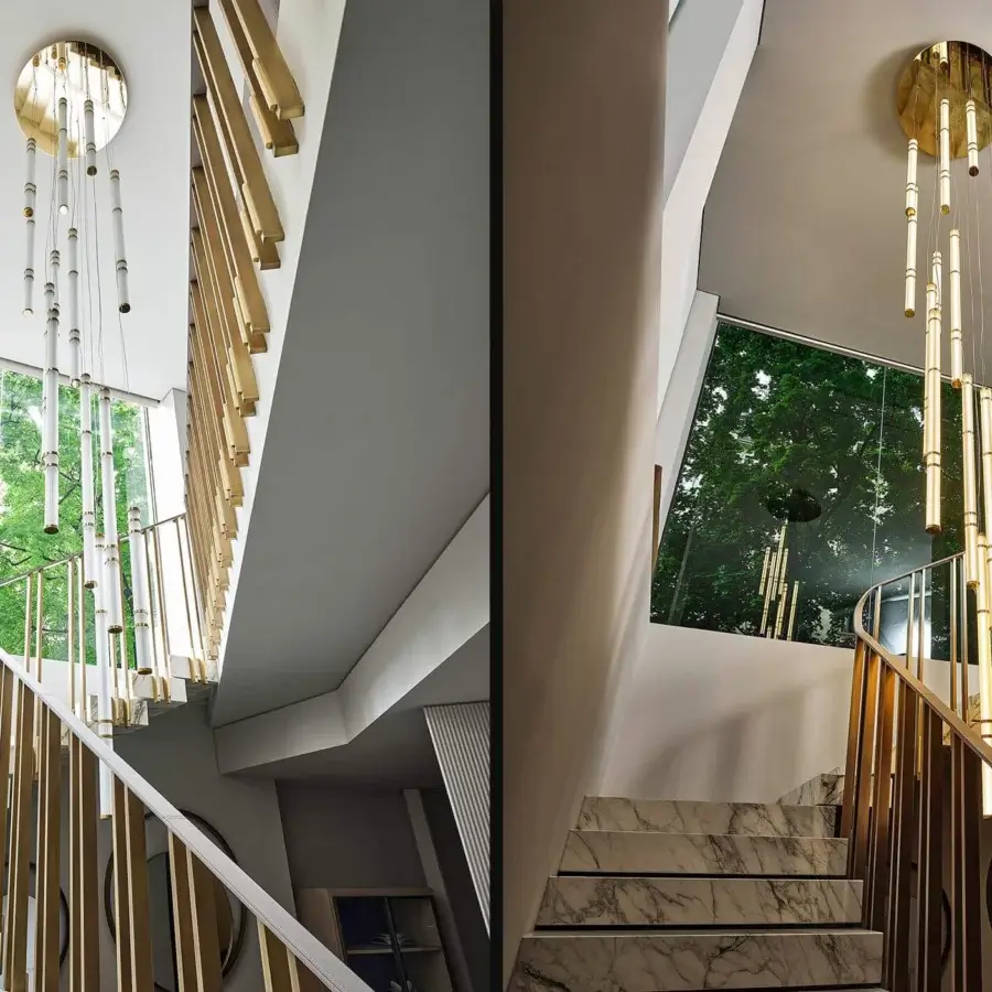 Elegant Rugiano Atrium suspension lamp with geometric sandblasted glass tubes and gold varnished brass details
