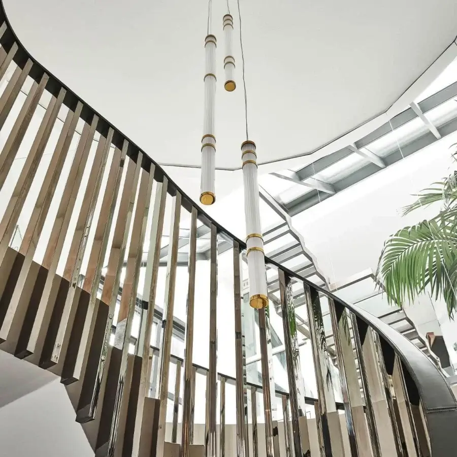 Exceptional Rugiano Atrium suspension lamp with vertically arranged sandblasted glass tubes and gold varnished brass canopy