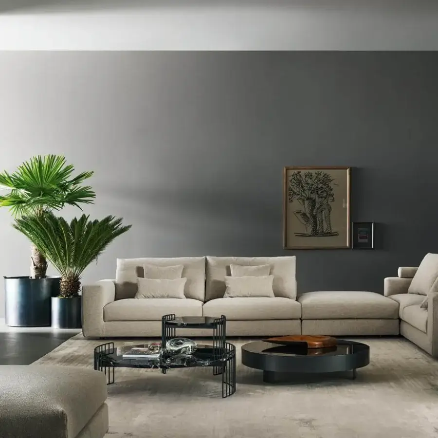 Elegant Bonaldo Superhiro sectional with light beige textile upholstery and matt black painted metal cylindrical feet
