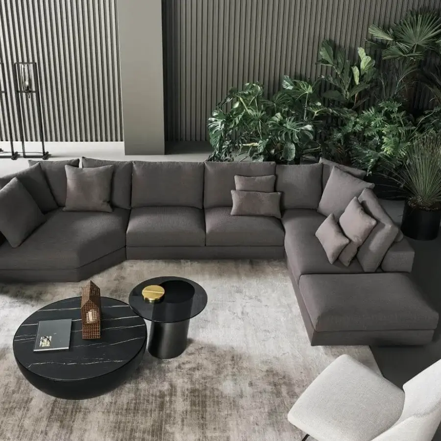 Elegant Bonaldo Superhiro sectional with dark gray textile upholstery and matte finish built upon cylindrical black metal feet
