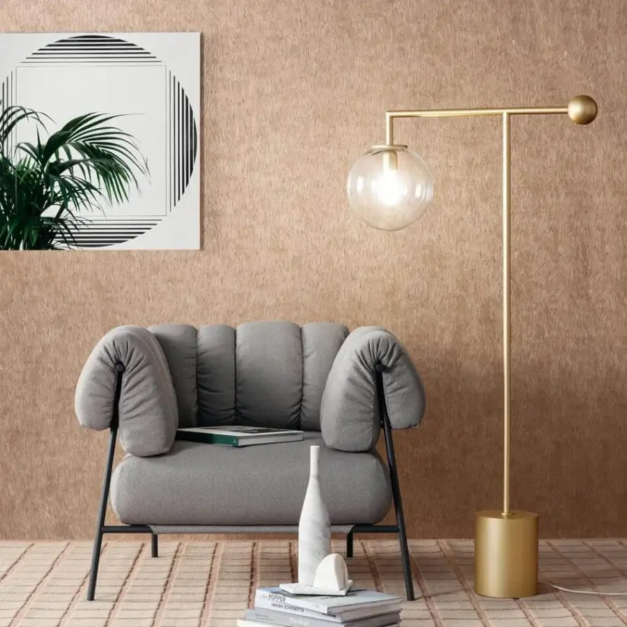 Refined Bonaldo Bardot floor lamp with geometric metal structure and transparent glass globe in glossy gold finish
