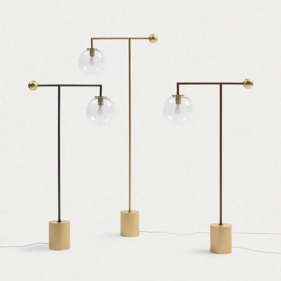 Distinguished Bonaldo Bardot floor lamp with geometric metal structure and transparent glass globe in brass finish