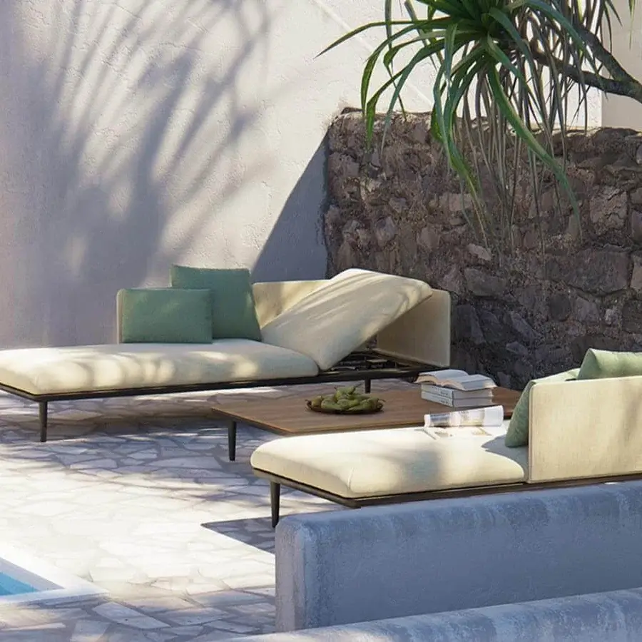 Exceptional Royal Botania Styletto lounge lounger with light beige textile cushions and sleek dark metal stiletto-shaped legs