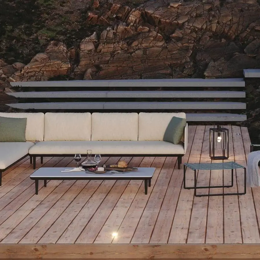 Superior Royal Botania Styletto Lounge sectional with plush light beige textile upholstery, dark metal legs and teak wood coffee table