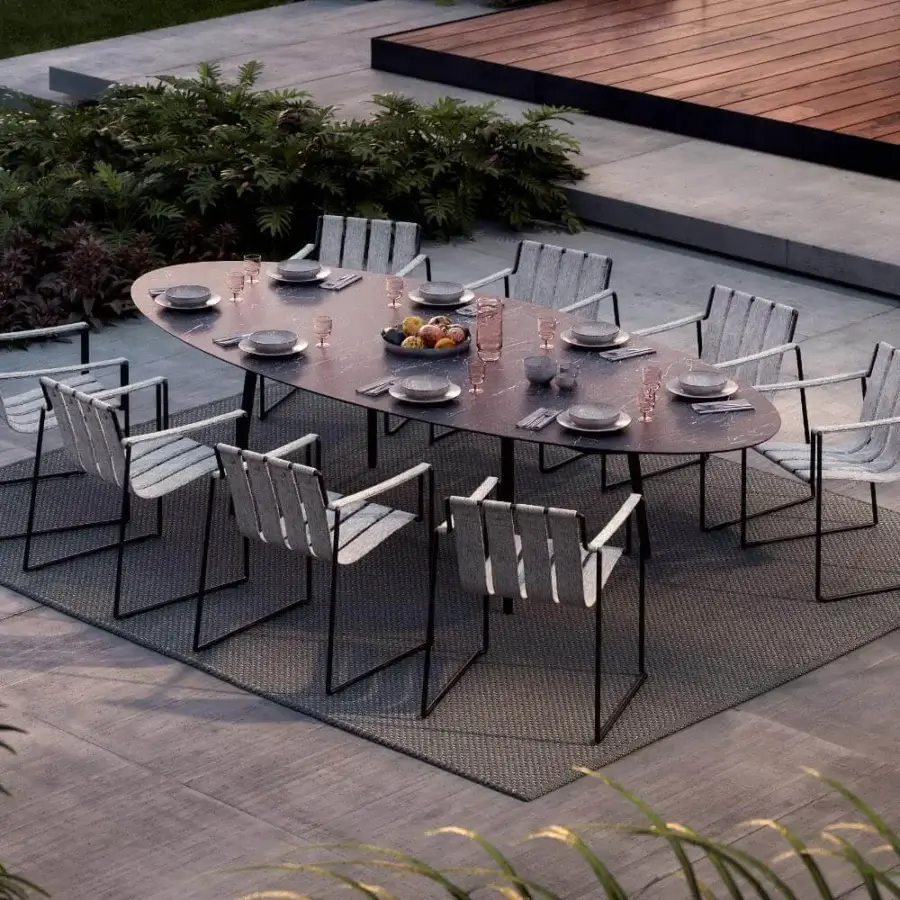 Distinguished Royal Botania Styletto table with tapered legs in coated aluminum and gray ceramic top with matte black finish