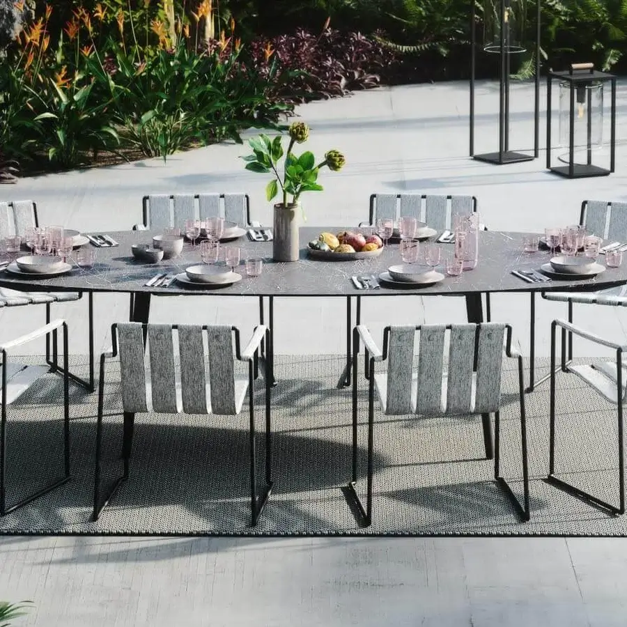 Exceptional Royal Botania Strappy armchair with coated stainless steel frame and gray white textile straps in matte black finish