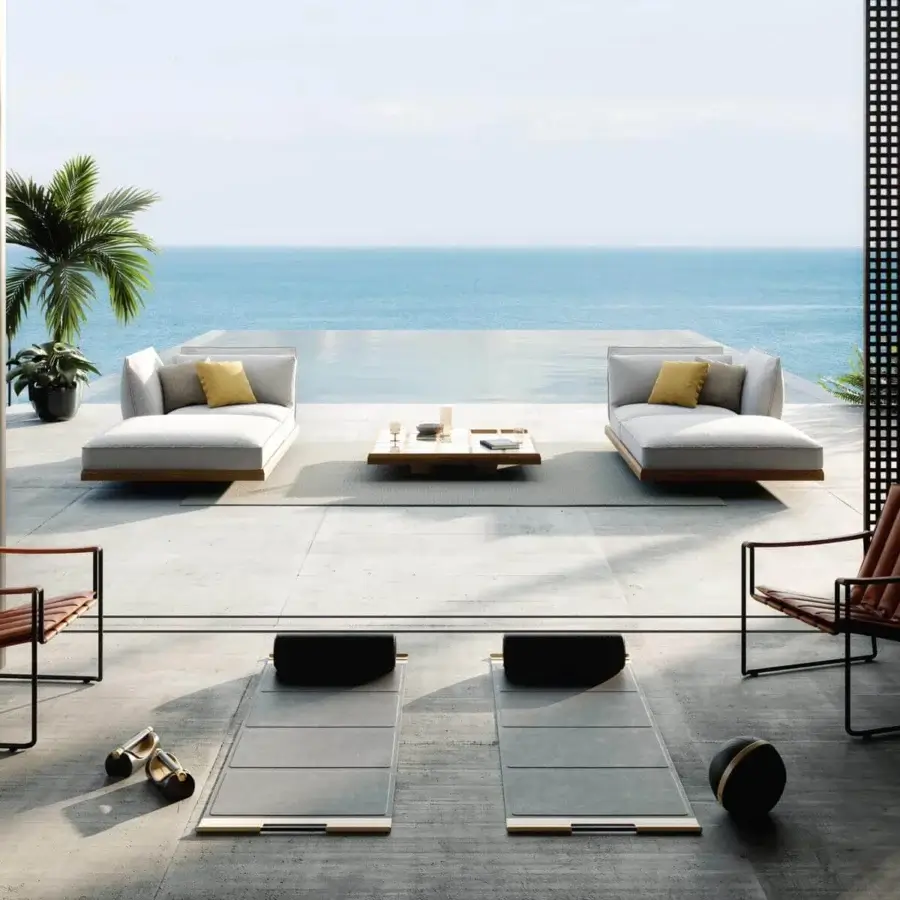 Elegant Royal Botania Strappy lounge chair with matte black coated stainless steel and medium brown eco-leather straps