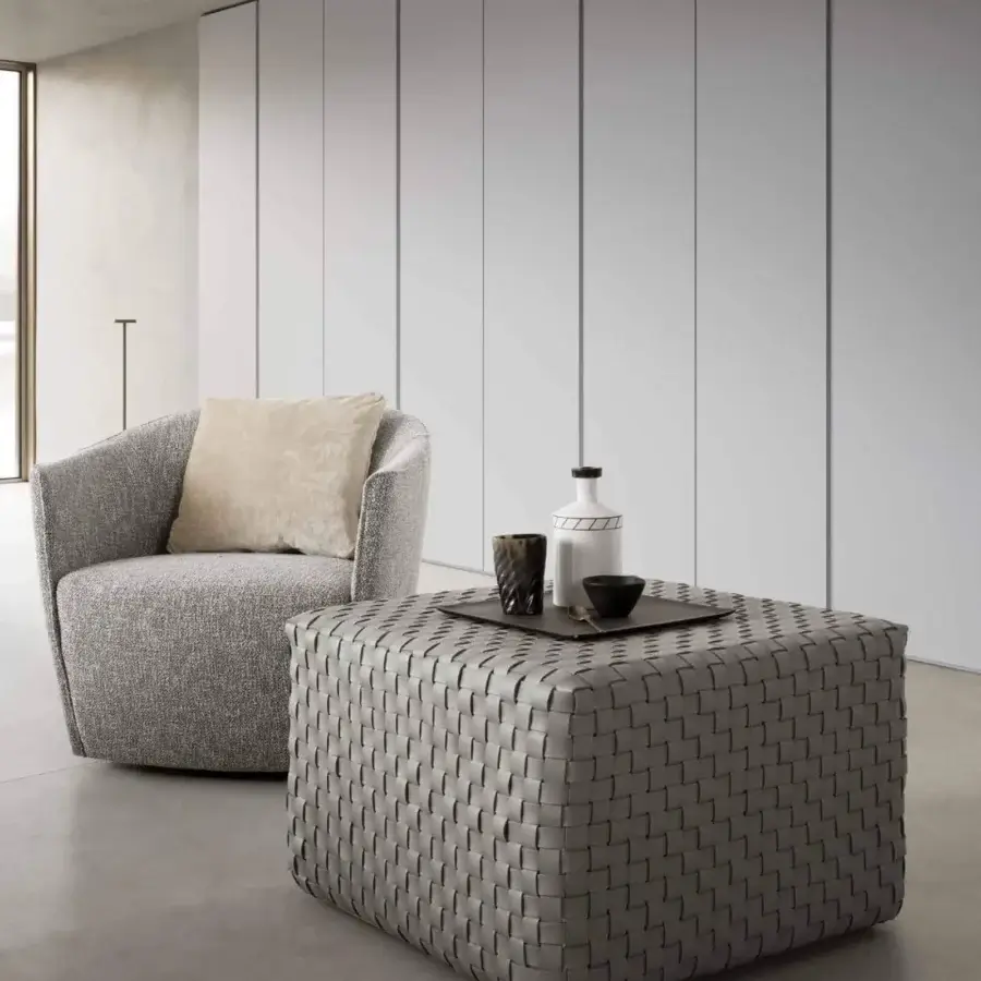 Distinguished Presotto Dama ottoman with hand-woven vegetable-tanned leather and uniform matte grey textural grid finish