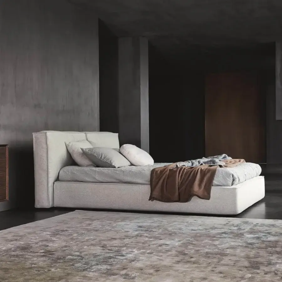 Distinguished Ditre Italia Flann bed crafted in Italy with light grey textile upholstery and padded headboard