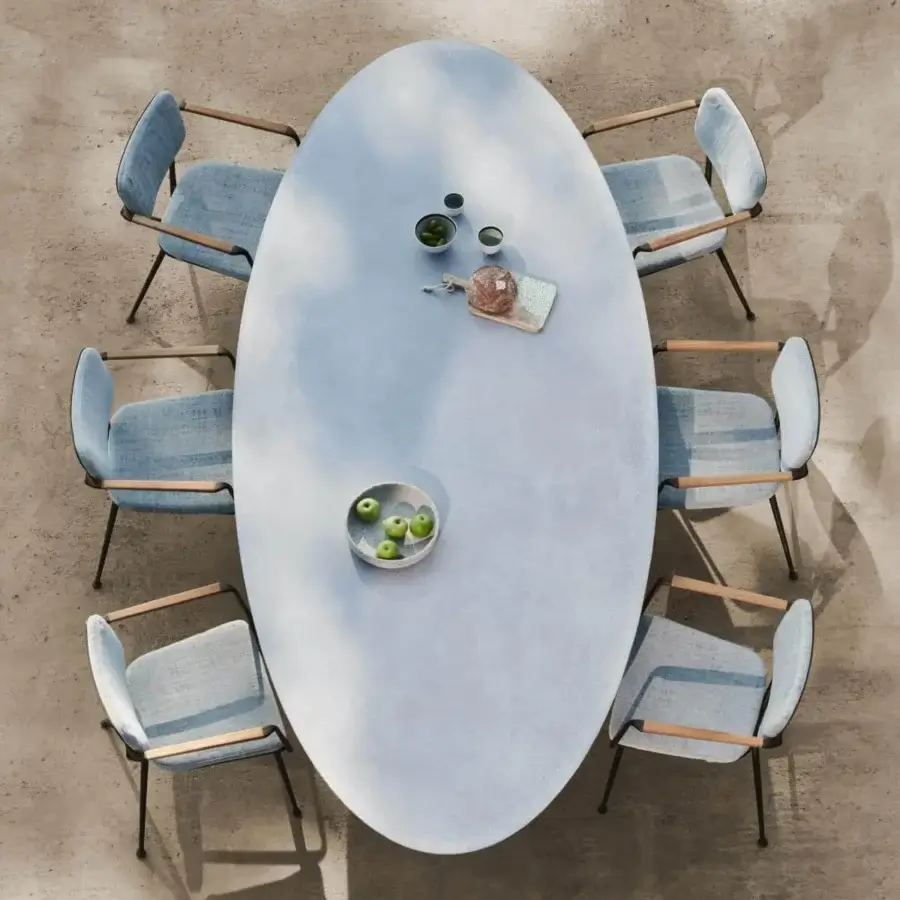 Distinguished Royal Botania Conix table with fibre-reinforced Ductal® concrete base and smooth light blue concrete top crafted with a polished finish
