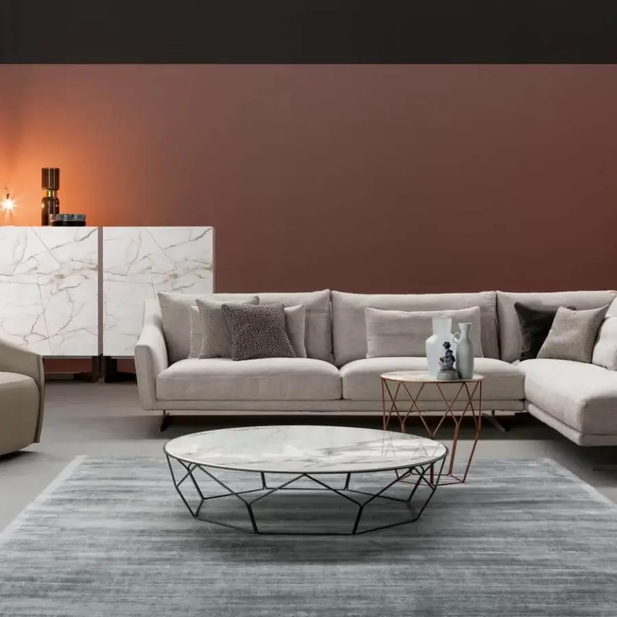 Distinguished Bonaldo Arbor coffee table with curved metal rods supporting a marbled glass top in light grays and whites with a light gray finish