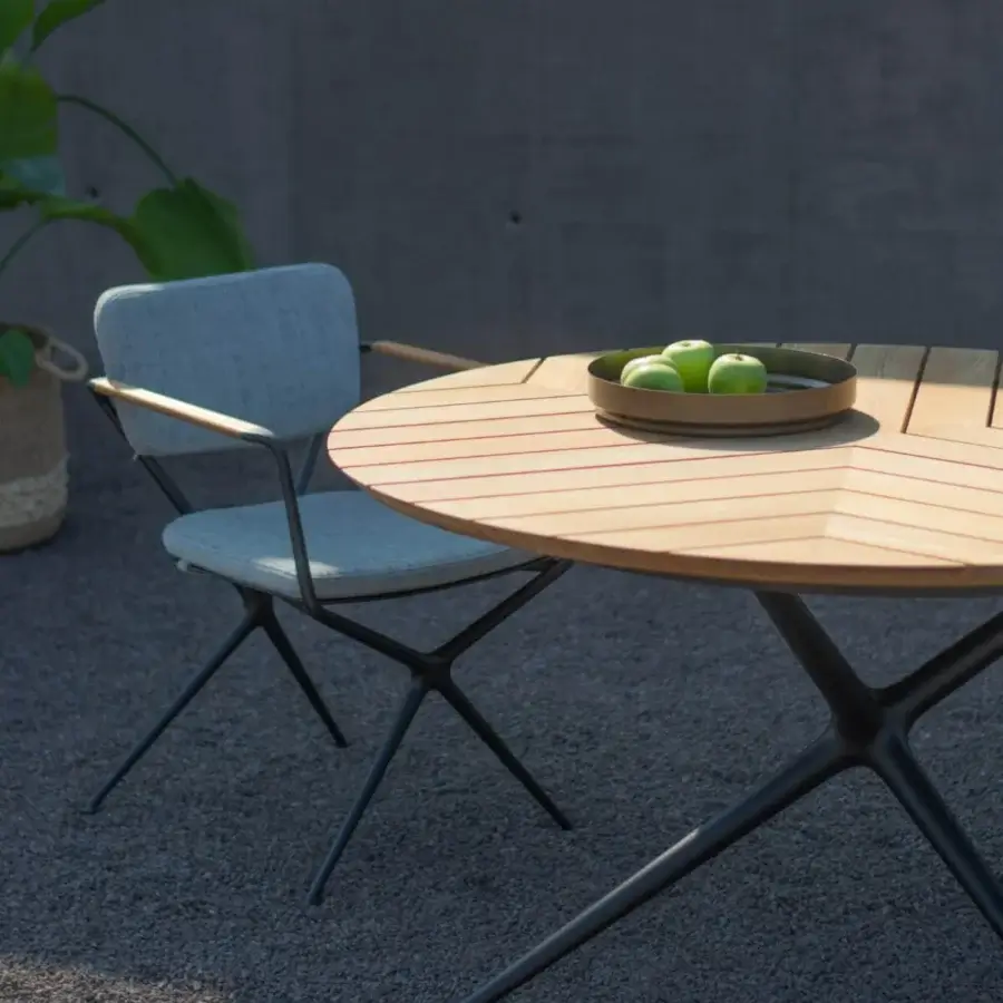 Sophisticated Royal Botania Exes table with light brown teak wood tabletop and dark gray matte coated aluminum base