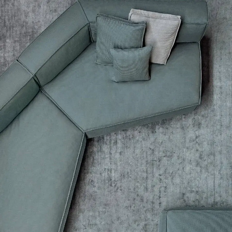 Superior Bonaldo Peanut B.X sectional upholstered in muted teal fabric with matte finish and cylindrical anthracite grey wood feet