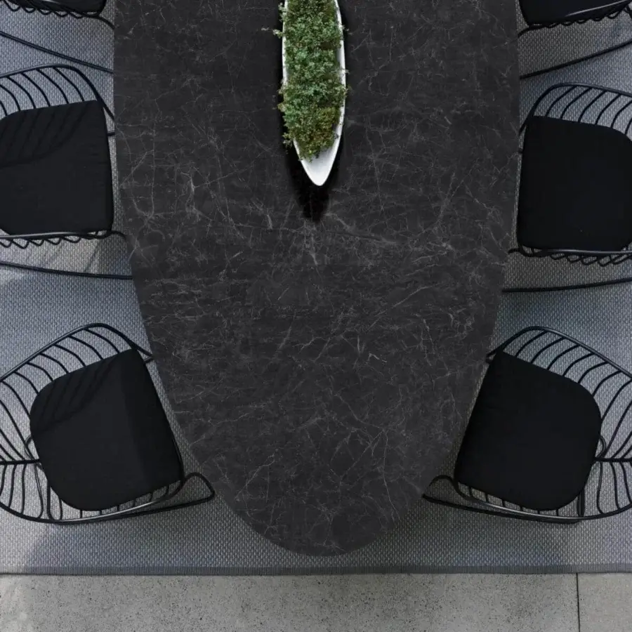 Exceptional Royal Botania Exes table with a dark ceramic top displaying lighter grey veining and coated aluminum base